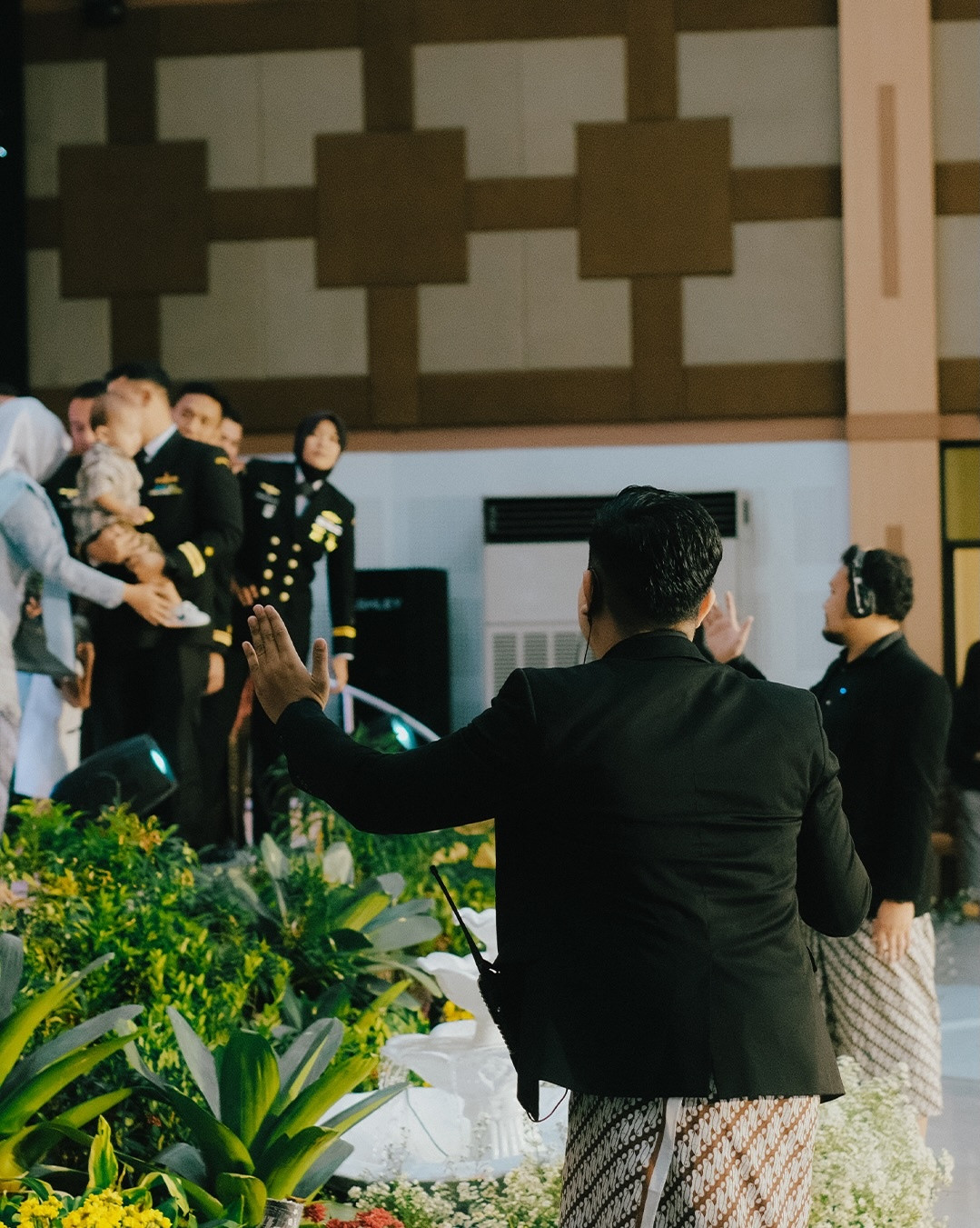 Ore team member guiding guests at a reception